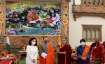 Bhutan Prime Minister Lotay Tshering (2R) on the arrival of
