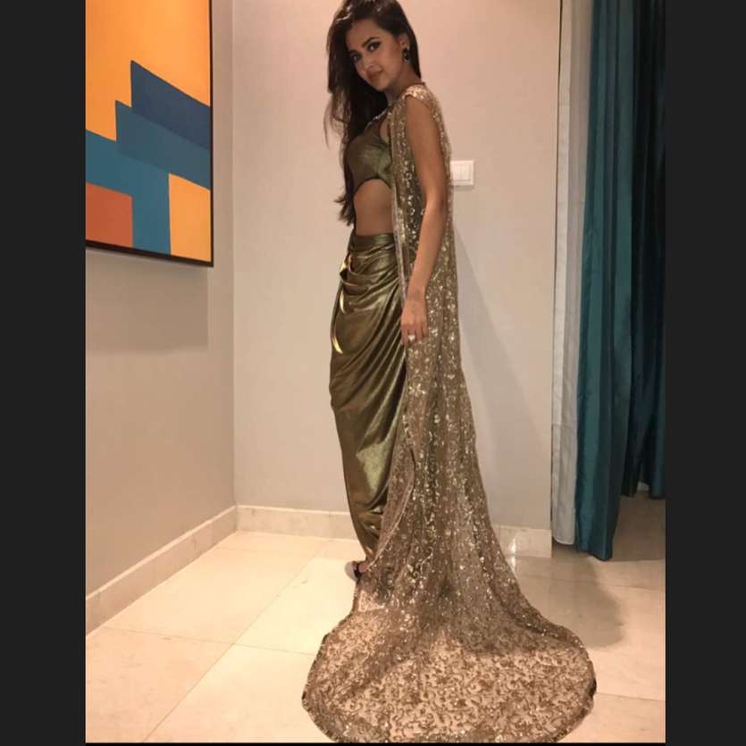 Who else fell in love with this shimmery Khaki-coloured dress by Alpa and Reena