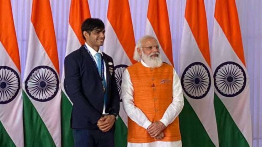 PM Modi poses for a photo with Neeraj Chopra.