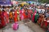 Pilgrims wait in queues to get themselves registered for